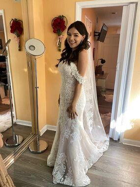 Elegant White Lace Off-Shoulder Wedding Dress with Cathedral Veil